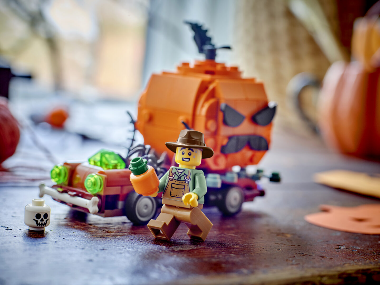 Close up of a pumpkin and a farmer made out of LEGO