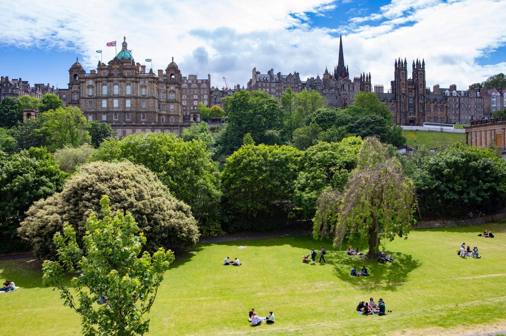 People sunbathing at Princes Street Gardens