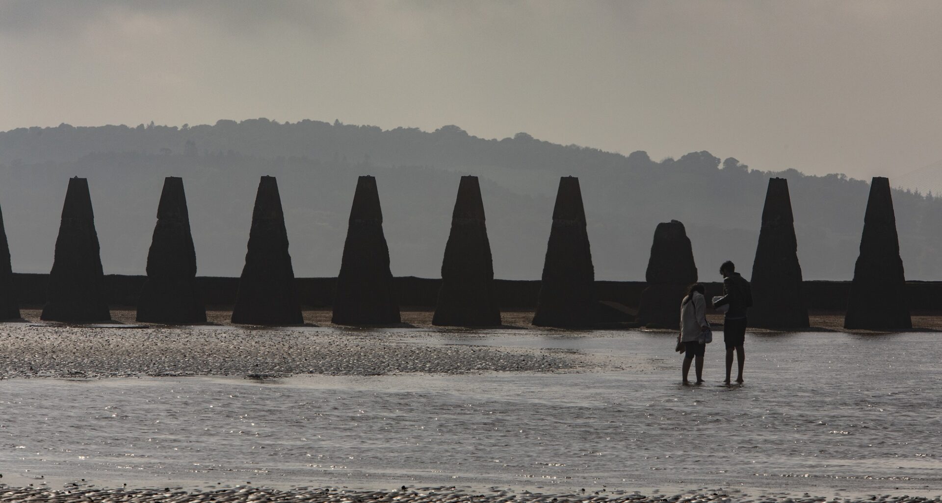 Cramond, couple walking on beach