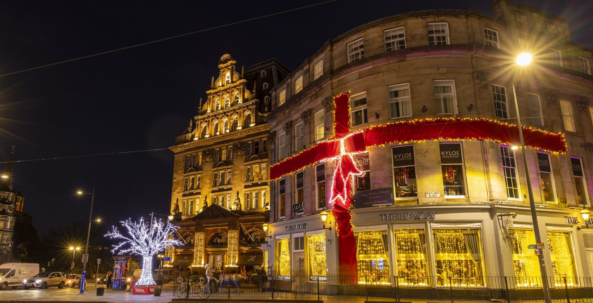 edinburgh-christmas lights and ribbon around the Johnnie Walker Experience building.