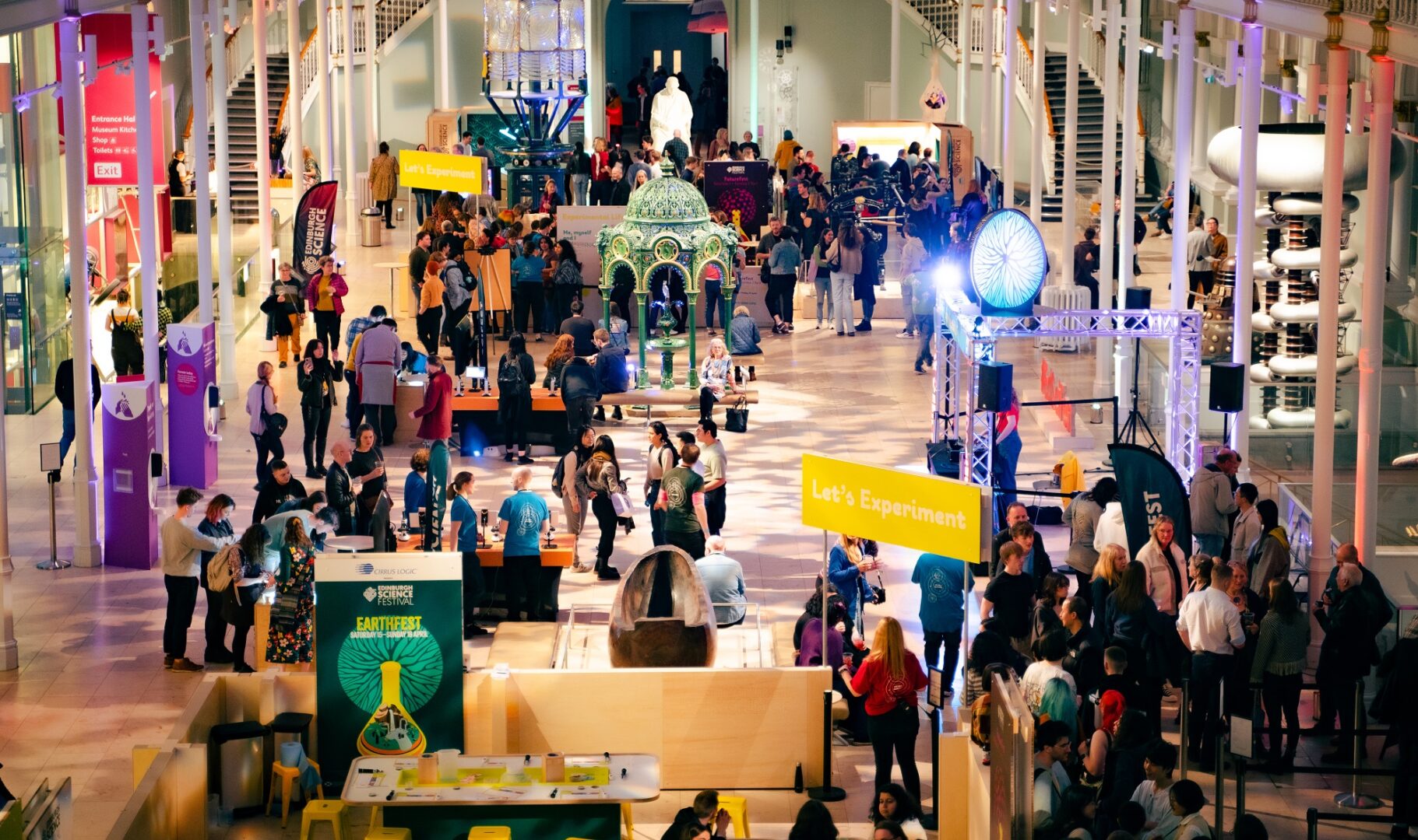 Stalls set up with experiments for the Edinburgh Science Festival at the after hours event