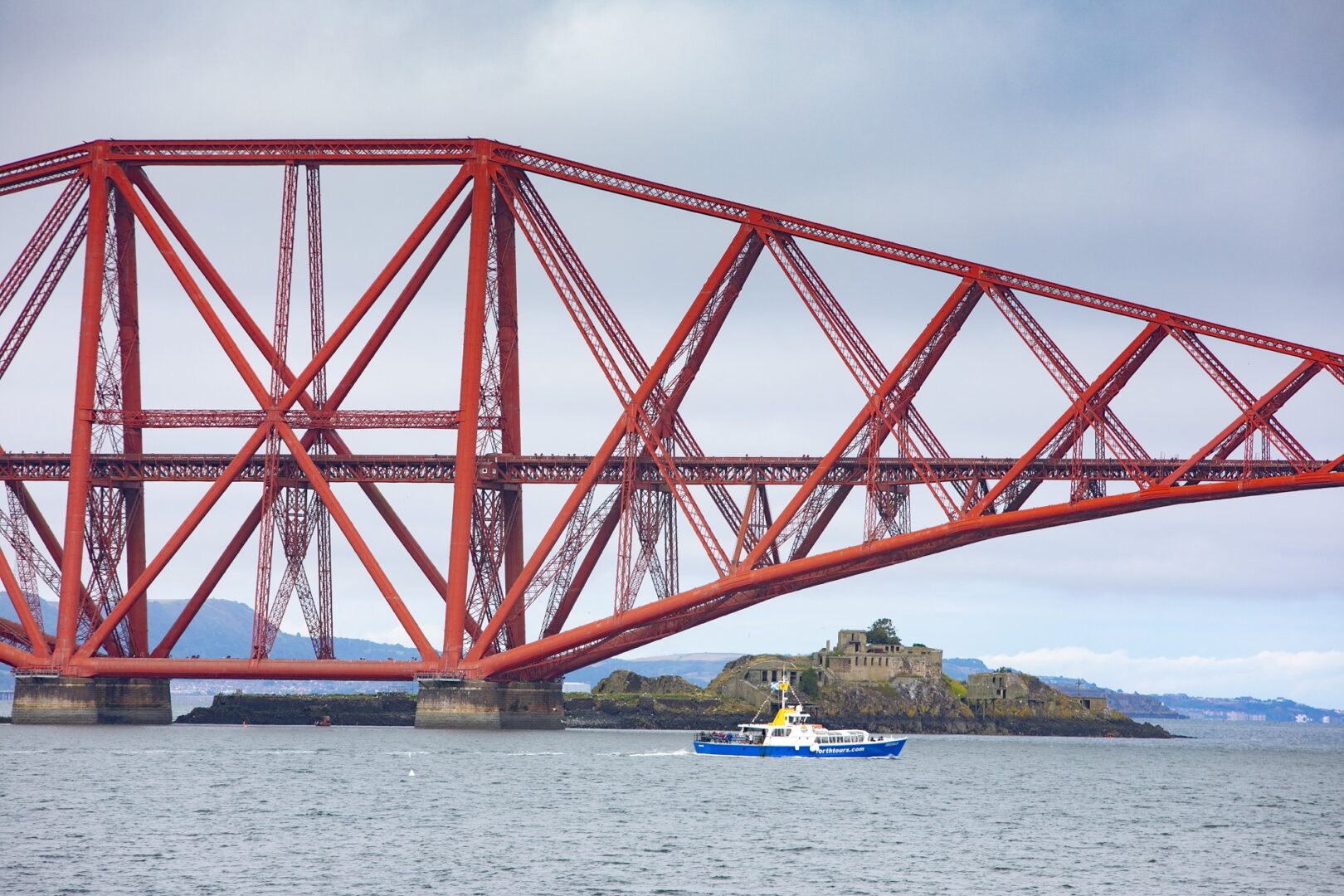 Forth Rail Bridge boat sailing under