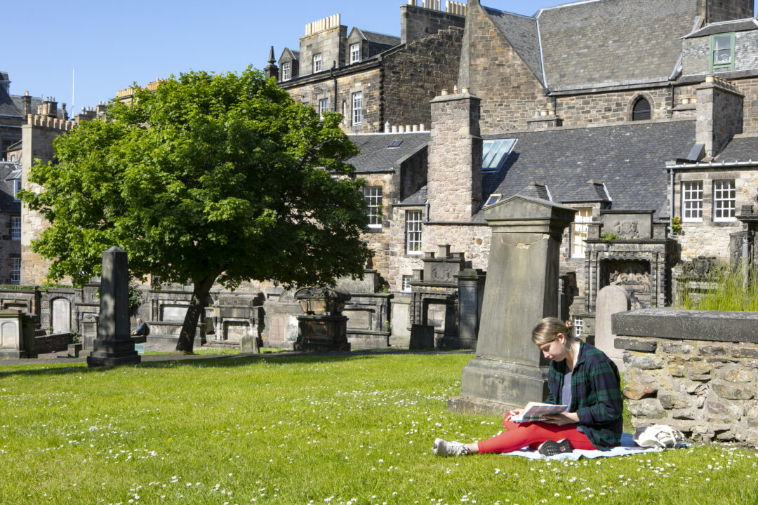 Grey-Friars-Graveyard-student-reading-book-