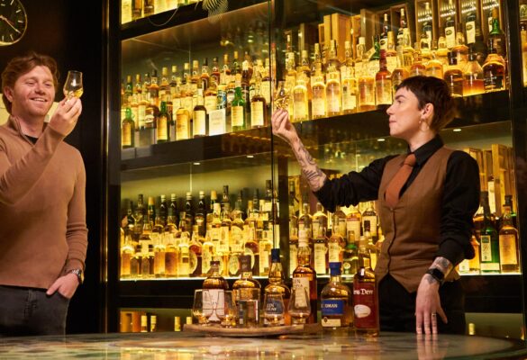 Man and Tour Guide Whisky Tasting at the Scotch Whisky Experience