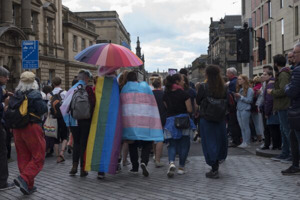 Group of people with Pride Umbrella om the 2019 Prride Scotia march