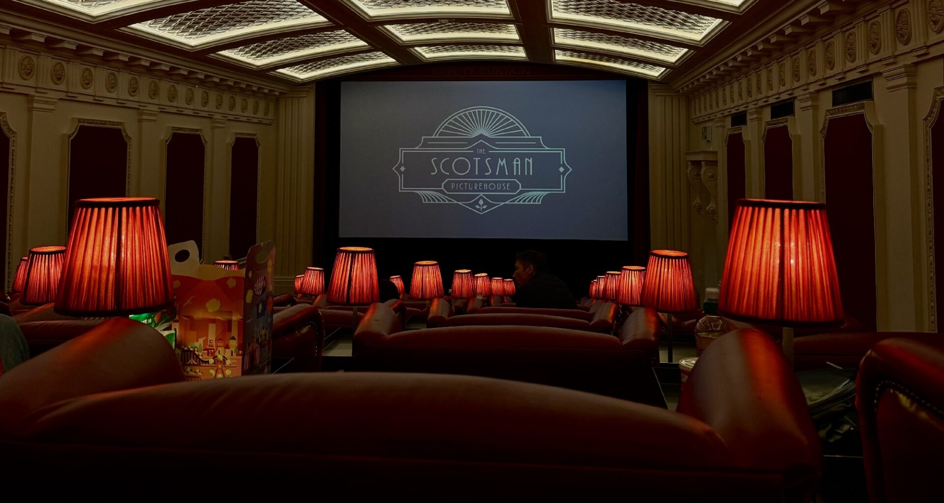 Scotsman Picturehouse Cinema screen, armchairs and lamps