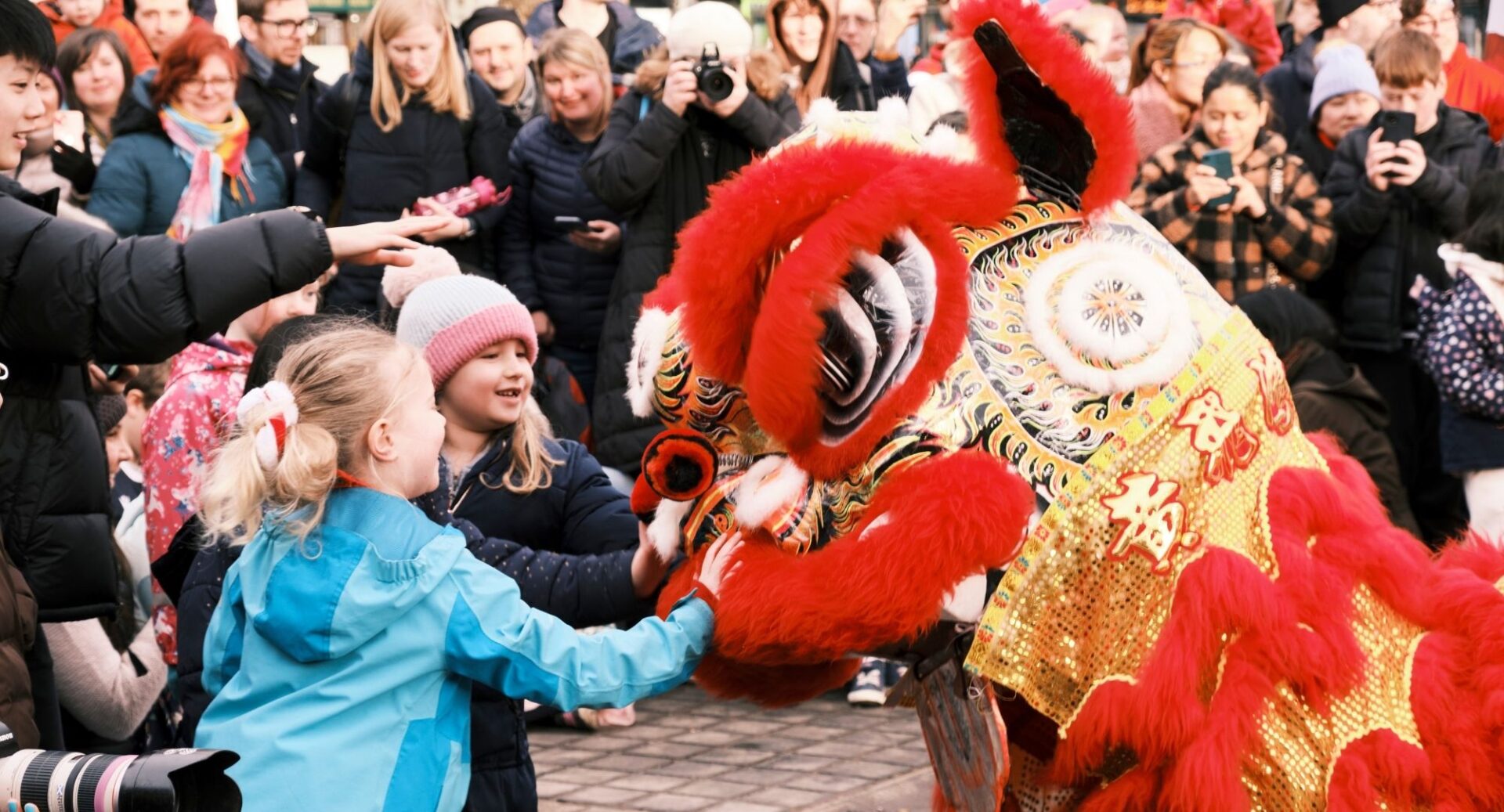 Chinese New Year Festival on the Mound with crowd looking at Chinese Dragon