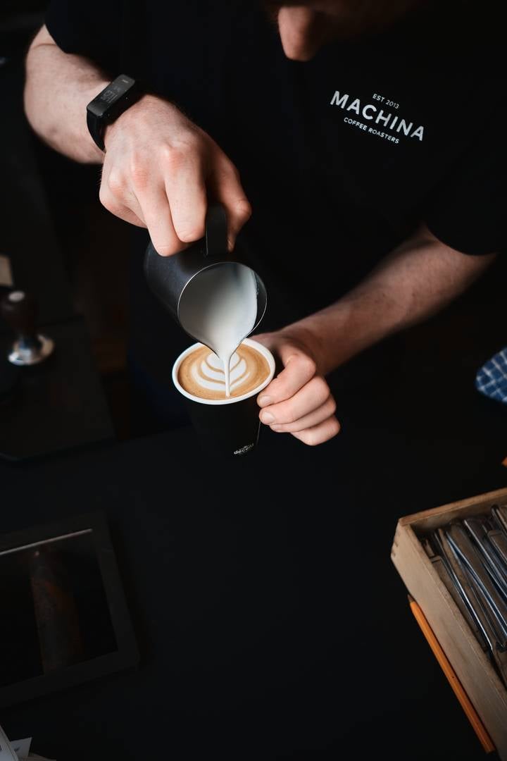 Man making coffee art