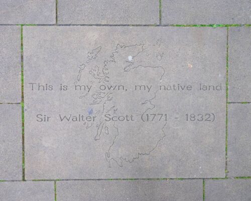 Paving stone reading 'This is my own, my native land' - Sir Walter Scott