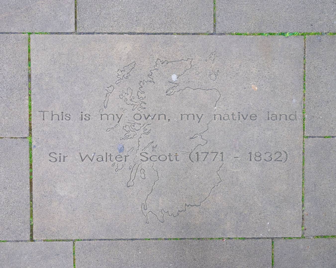 Paving stone reading 'This is my own, my native land' - Sir Walter Scott