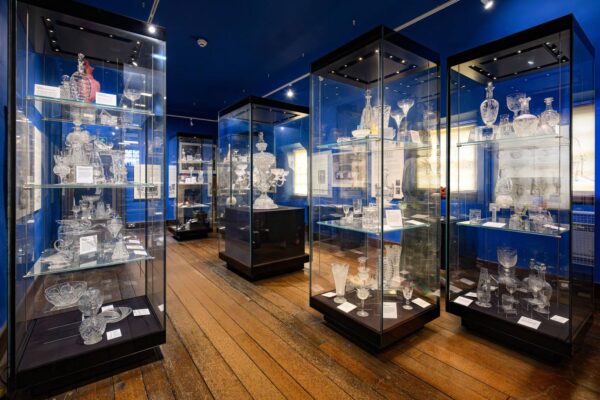 Glass cases holding glass ornaments and sculptures crafted locally