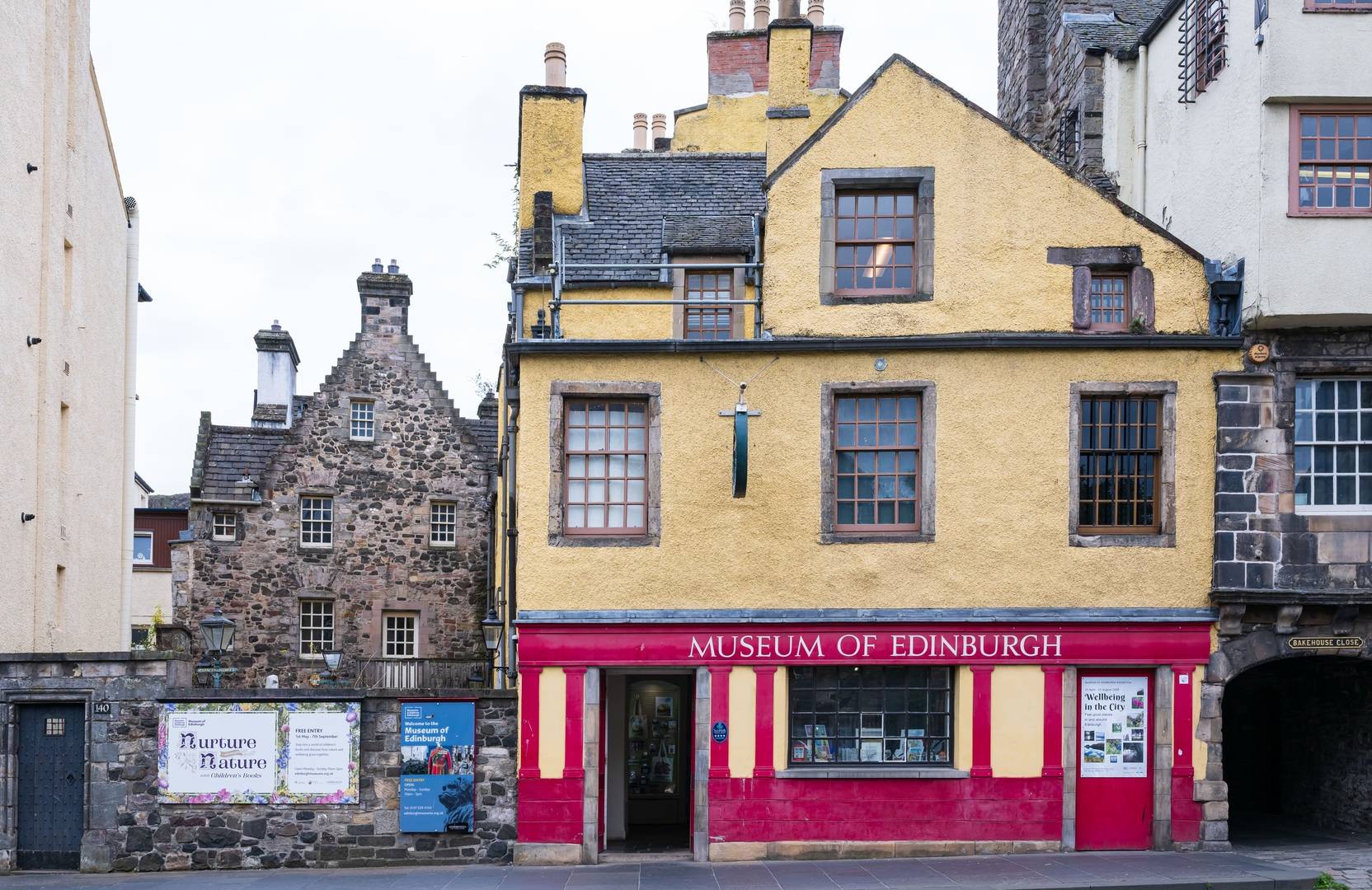 Yellow and red exterior of the Museum of Edinburgh