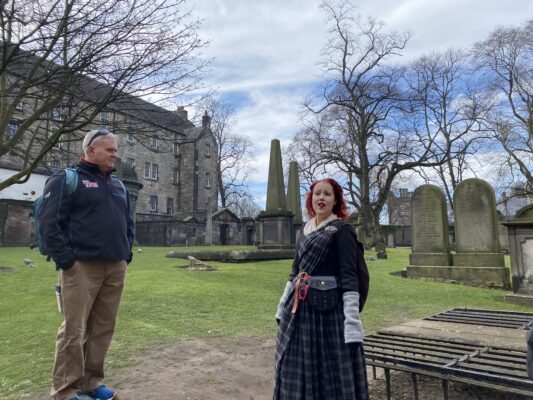 Walk the Old Town Guide with tour party at Greyfriars kirkyard