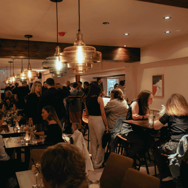 People sitting having drinks at Mara's